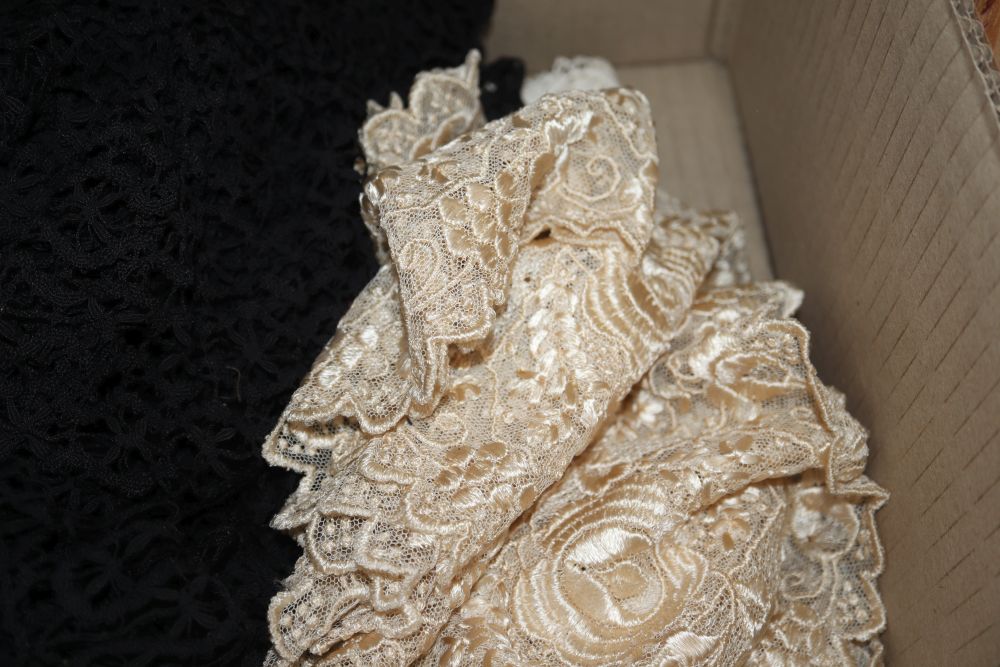 An Edwardian ladies lace blouse, a black bobbin lace shawl, a cream silk machine lace shawl and mixed trimmings